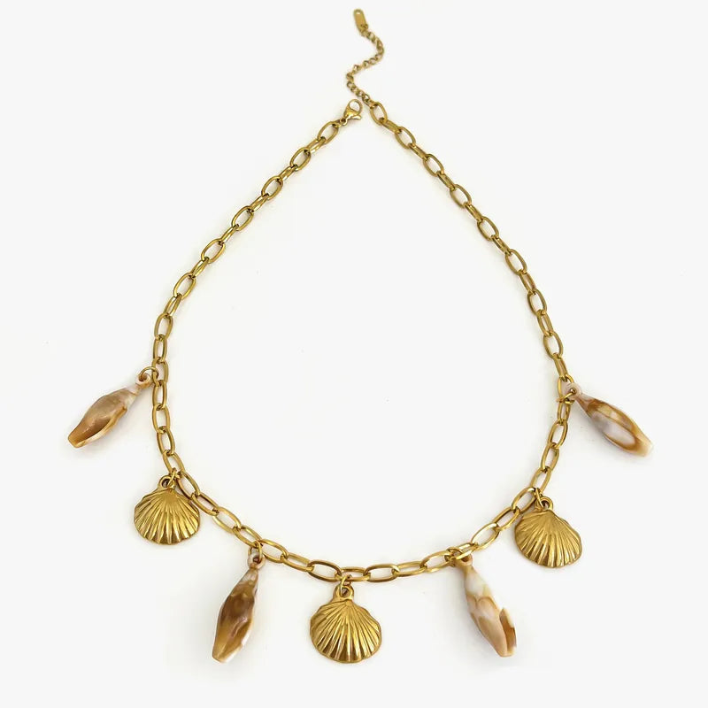 Gold Shell Charm Necklace – Coastal-Inspired Statement Jewelry